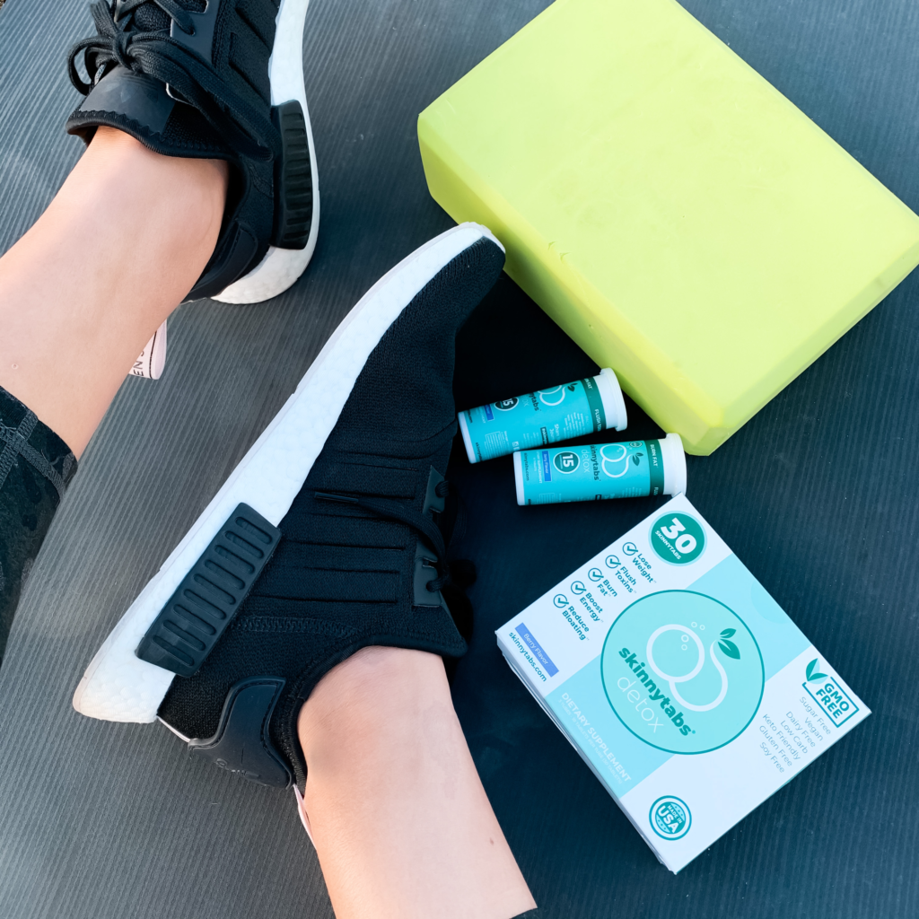 Shoes, yoga block, and Superfood Tabs