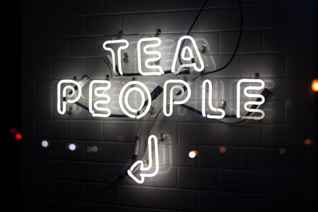 Neon sign that Says Tea People