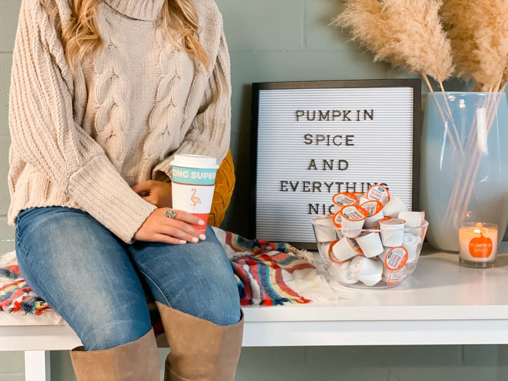 Woman drinking her Pumpkin Spice Latte out of a Super Amazing Coffee mug!
